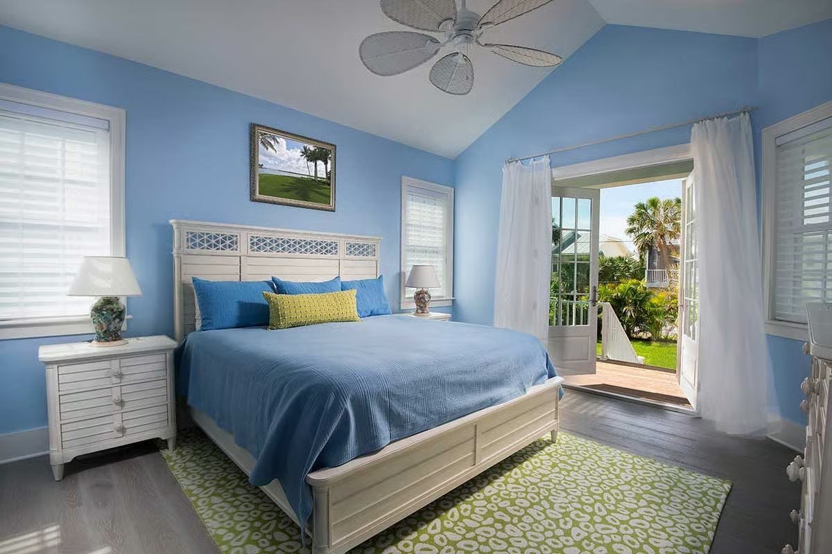 Periwinkle Walls and a Green Rug That Earns Its Place on the Floor