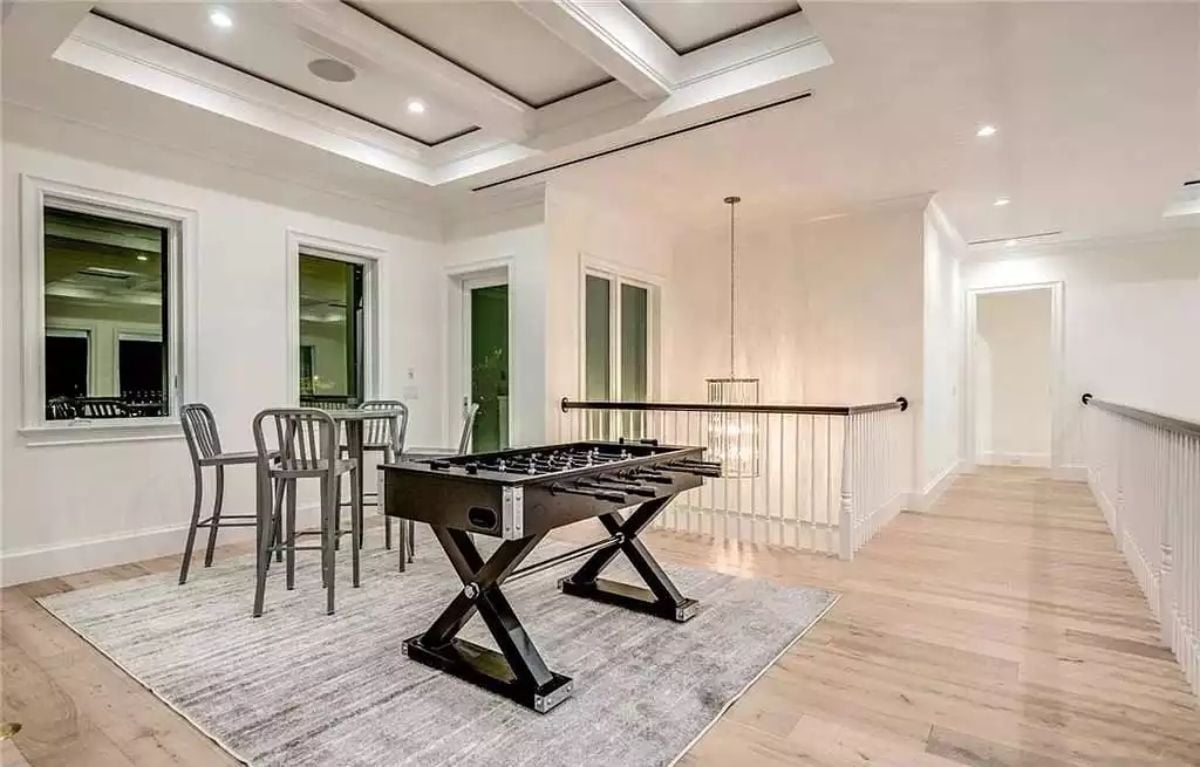 Foosball Table on the Upper Landing Proves Game Rooms Don't Need a Dedicated Floor
