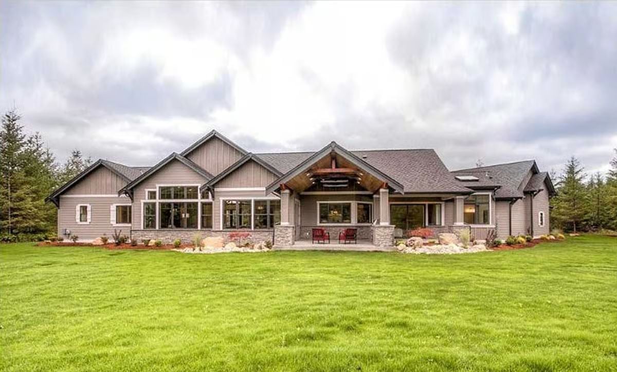 Covered Patio With Timber Gable Earns Its Place as the Real Main Entrance