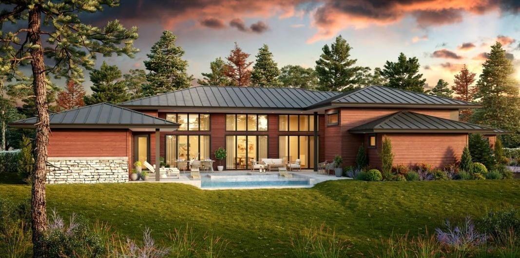 Red Brick and Steel Rooflines Frame a Backyard Built for Actual Living