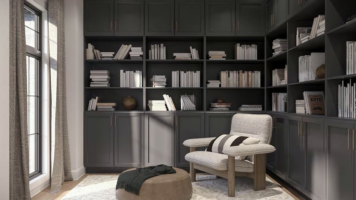 Dark Shelving Built Floor-to-Ceiling Does What Paint Alone Never Could
