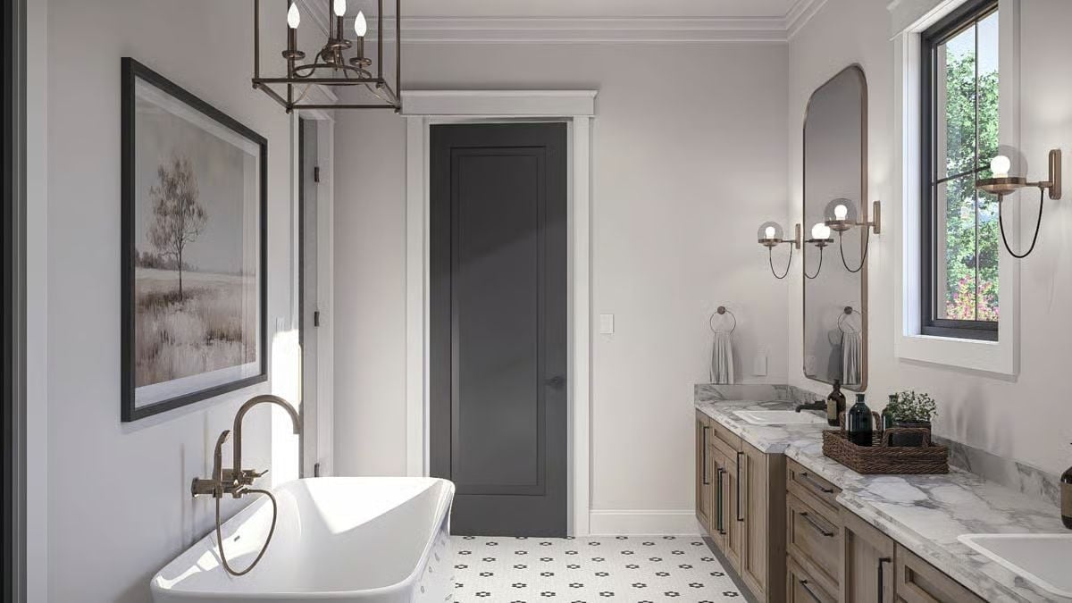 Freestanding Tub, Lantern Chandelier, and a Floor Pattern That Ties It All Together
