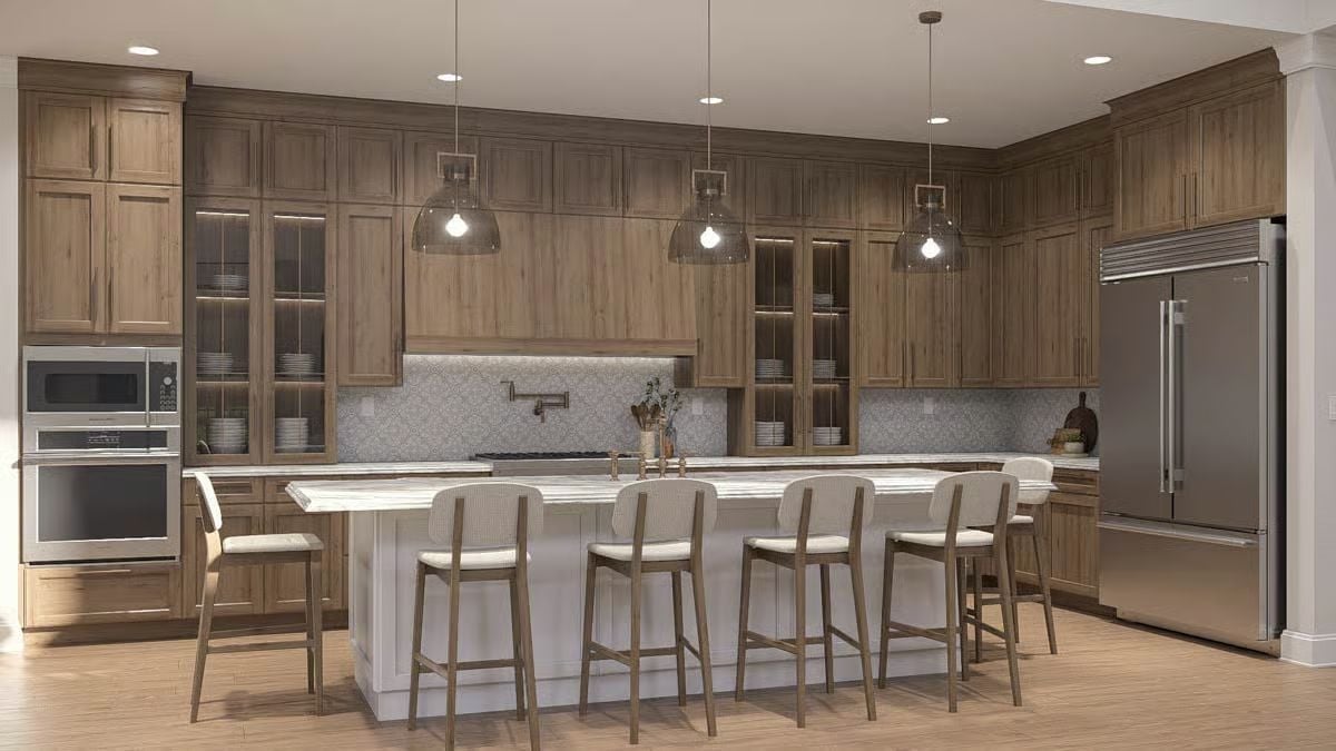 Pot Filler, Glass Pendants, and a Waterfall Island That Justifies Every Square Foot