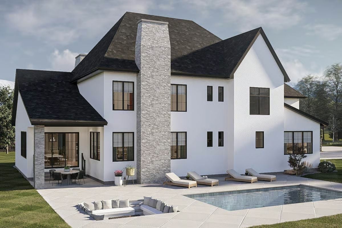 Rear Elevation Built Around a Chimney That Actually Earns Its Height