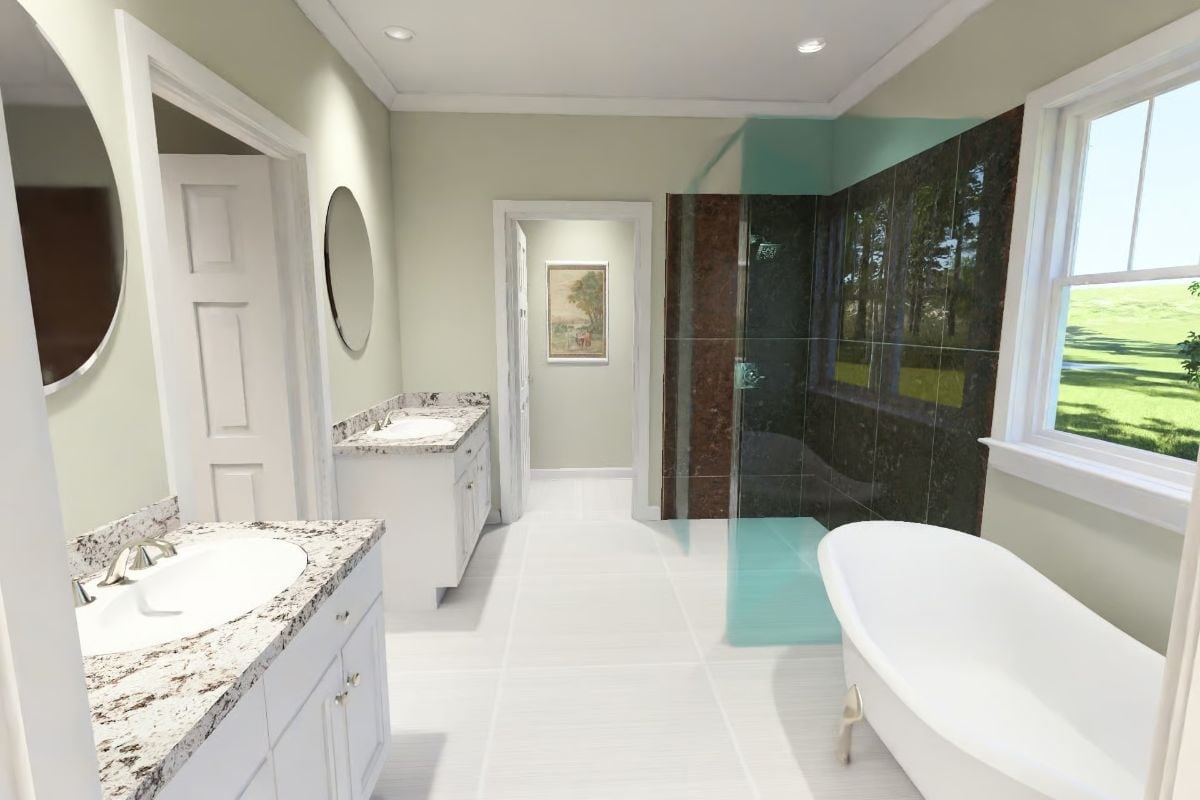 Freestanding Soaking Tub Beside a Window With an Actual View Worth Soaking Next To