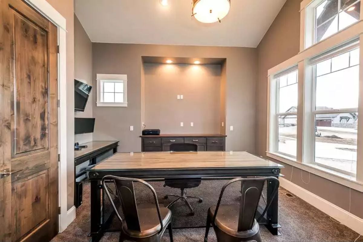 Industrial-Rustic Home Office Where the Built-In Niche Gets Its Own Lighting