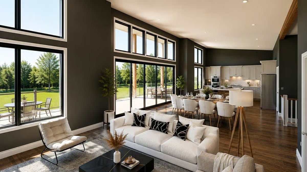 Dark Walls, Double-Height Glass, and a Kitchen That Doesn't Hide in the Back