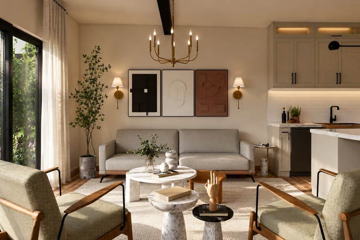Marble Coffee Tables, Wall Sconces, and a Plant That's Doing a Lot of Work