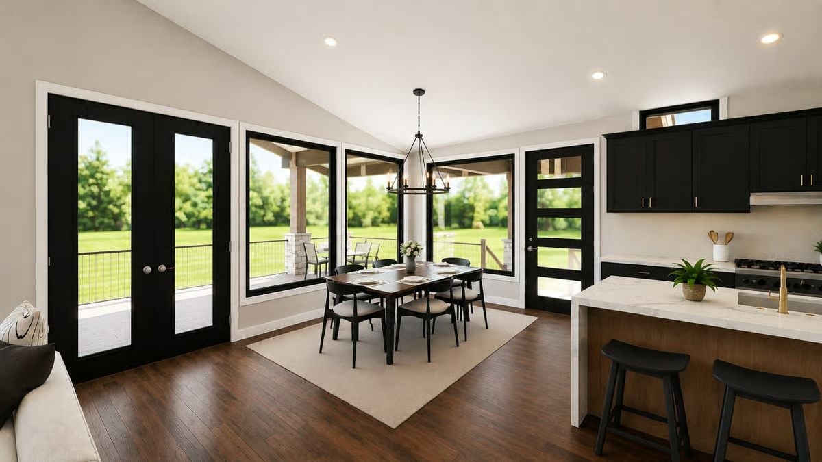 Dark Cabinets, White Stone Counters, and French Doors That Blur the Line Between Dining and Outside