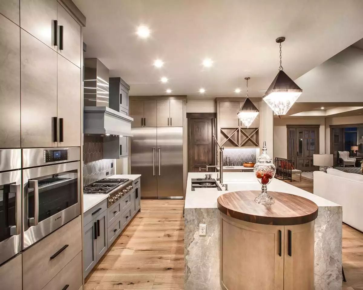 Waterfall Island with a Butcher Block Cap Earns Every Inch of Counter Space