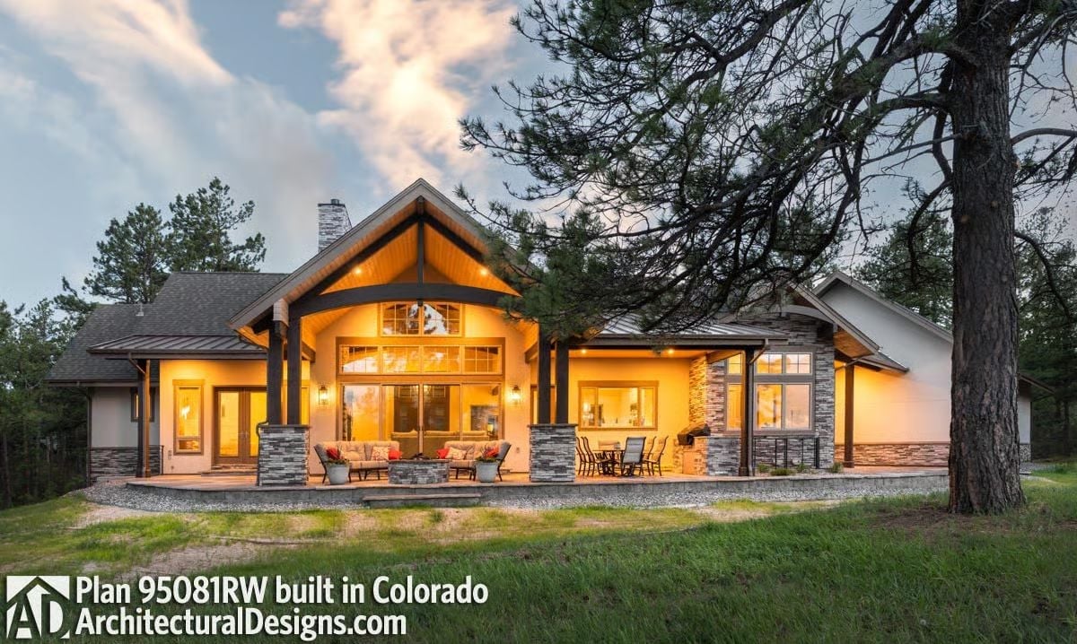 Warm Light Spills from Every Window on This Colorado Mountain Rear Exterior