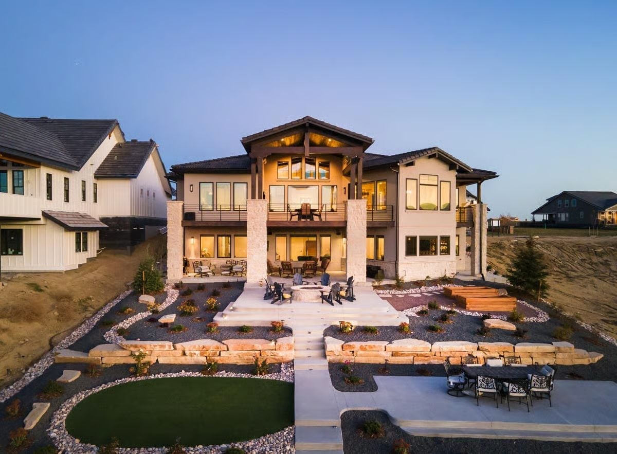 Stone Columns, Fire Pit, and a Putting Green Nobody Asked For But Everyone Loves