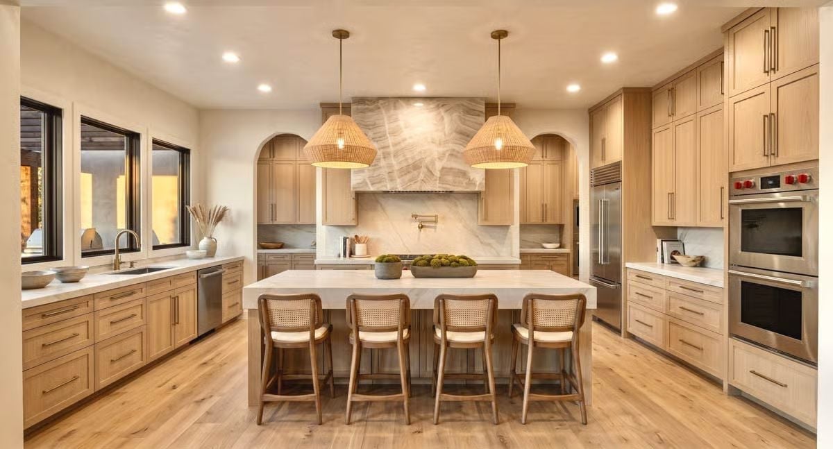 Rattan Pendants and Marble That Earned Its Place on the Range Hood