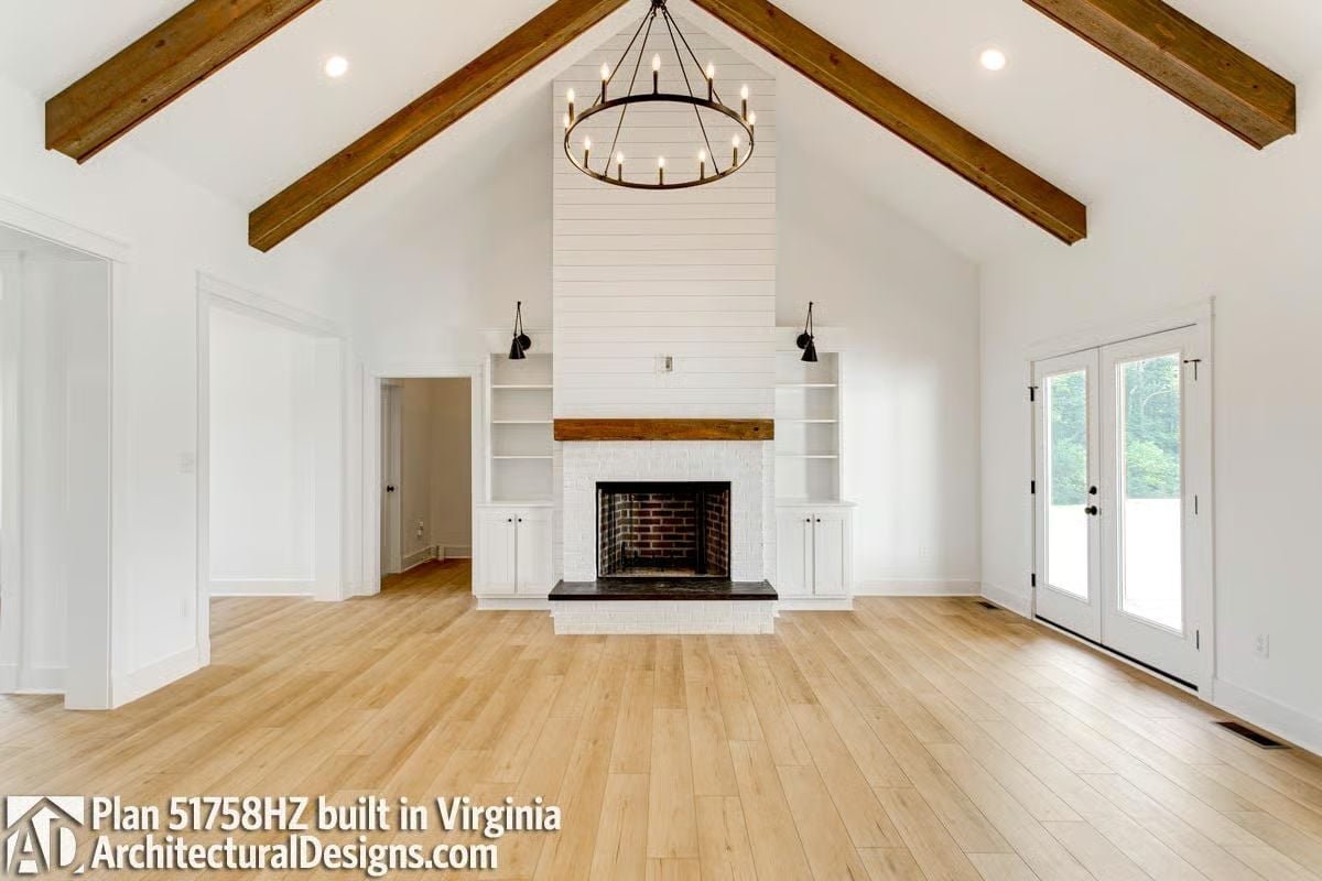 Vaulted Ceilings, Exposed Beams, and a Fireplace Wall That Commands the Room