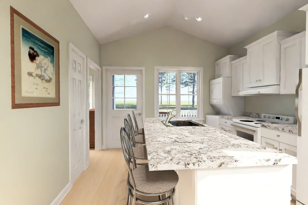 Granite Counters and a Sink Tucked Into the Island Keep This Kitchen Honest