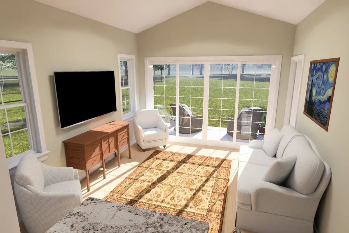 Vaulted Ceilings and Sliding Glass Doors Pull the Backyard Right Into the Living Room