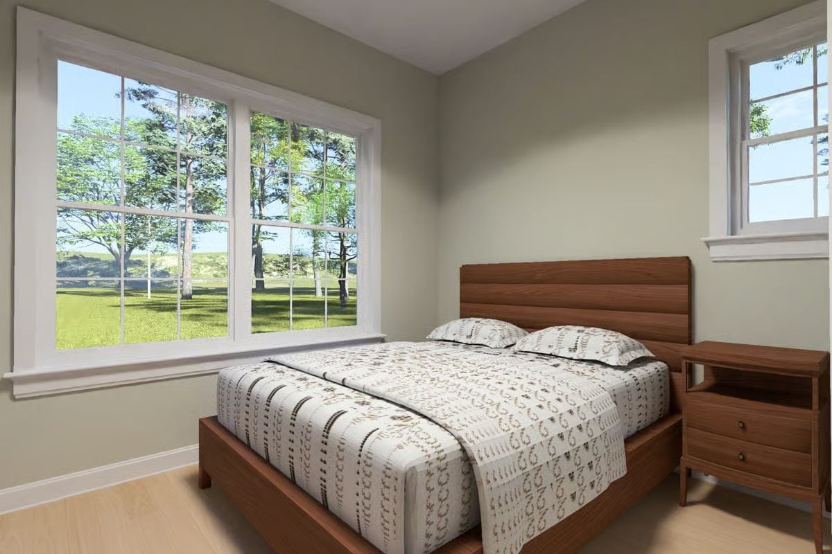 Walnut Bed Frame, Patterned Duvet, and a View That Does the Decorating
