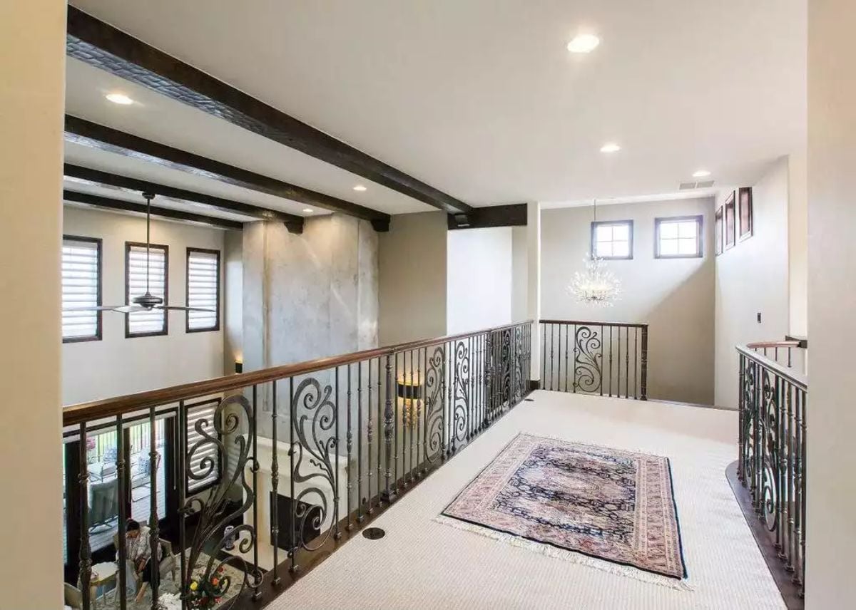 Ornamental Iron Railing on a Second-Floor Landing That Knows What It's Doing