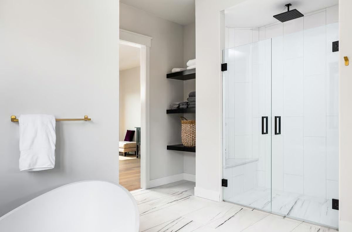 Rainfall Shower, Open Shelving, and a Soaking Tub That Gets Its Own Corner