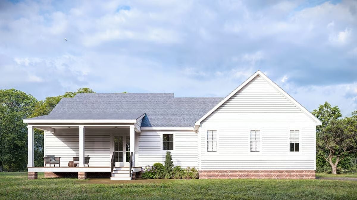 Covered Porch Living With White Lap Siding and Brick Foundation