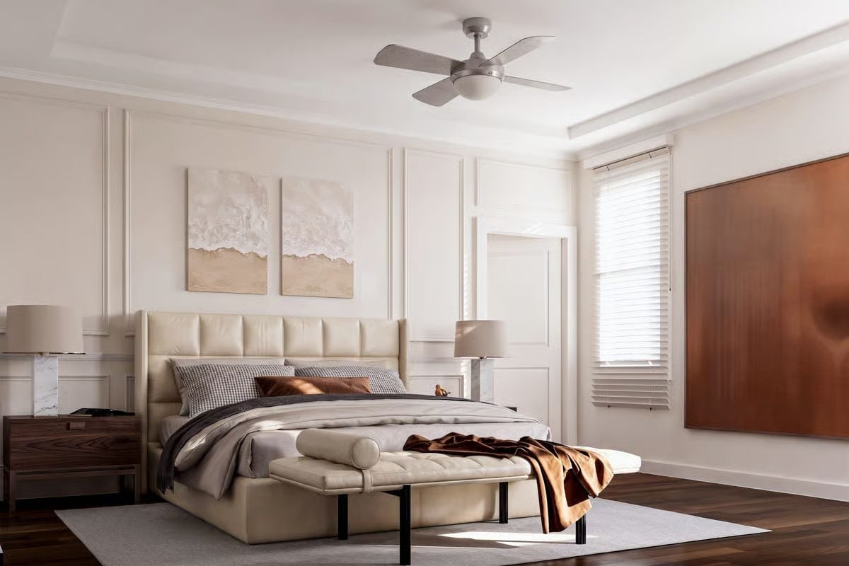 Cream Leather Headboard, Ceiling Fan, and Warm Copper Throws That Tie It Together