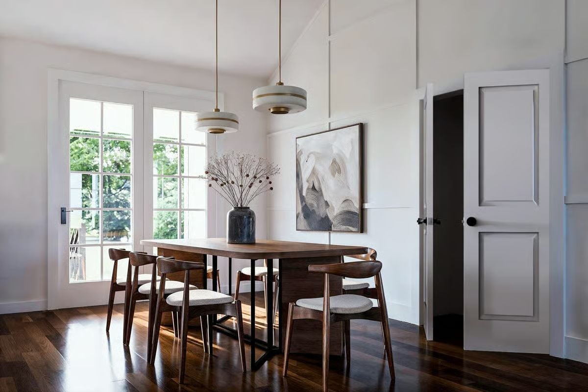 Mid-Century Walnut Dining Set Anchored by Pendant Lights with Brass Hardware