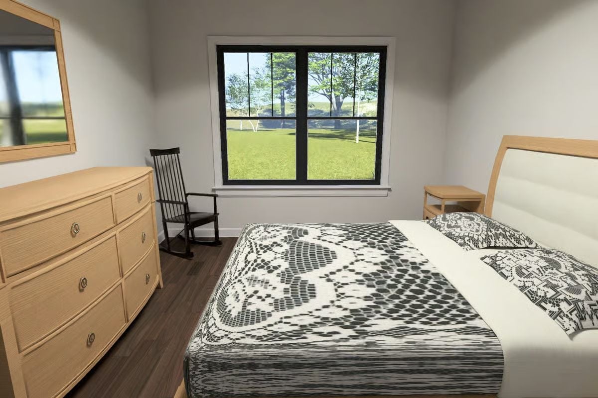 Rocking Chair by the Window, Lace Quilt on the Bed, Nothing Competing for Attention