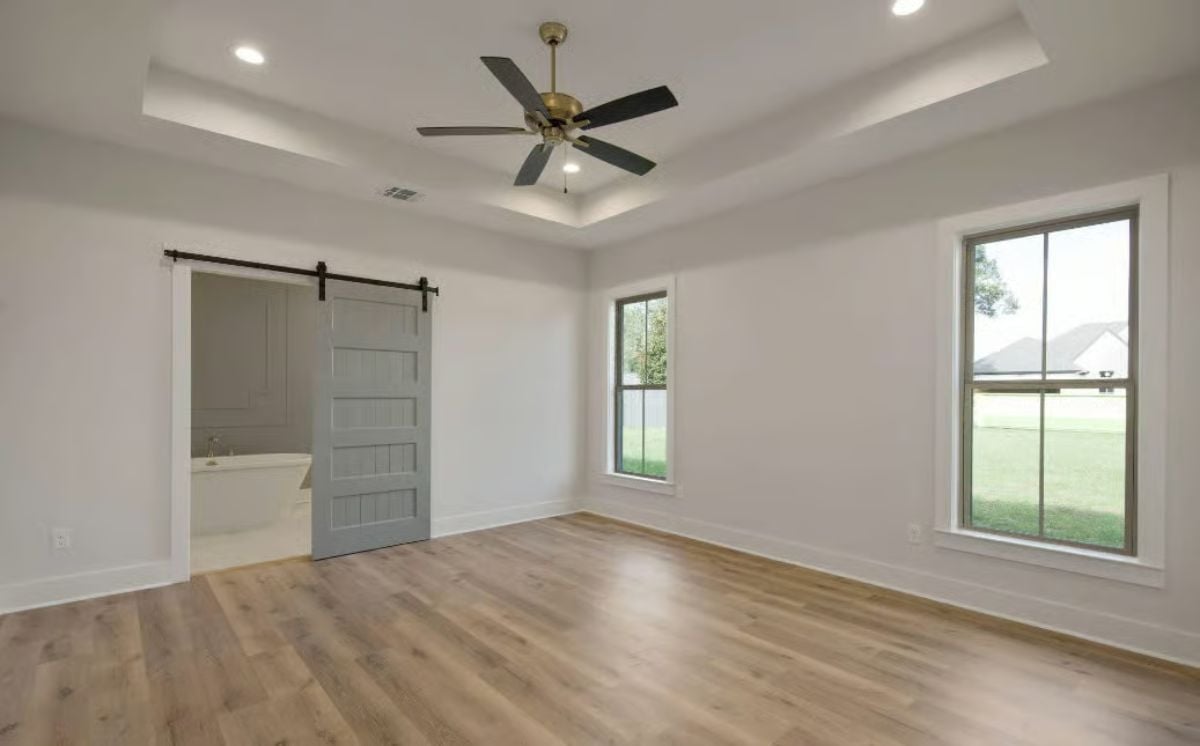 Barn Door, Tray Ceiling, Freestanding Tub Visible From Bed: Master Suite Done Right