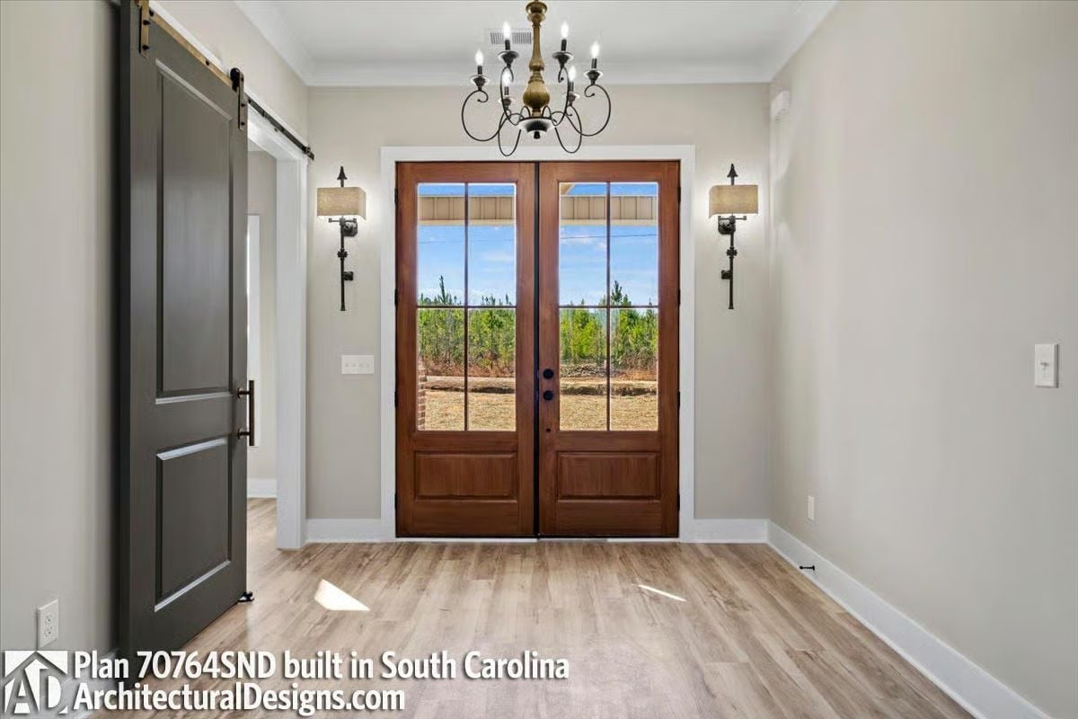 Double Wood Doors With Glass Panels Make an Entry Worth Walking Through