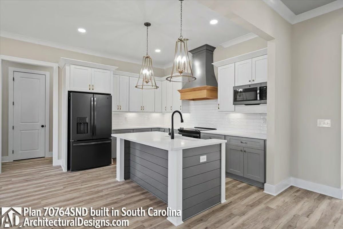 Shiplap Island Sides and a Black Faucet Offset From Center Change the Kitchen Math