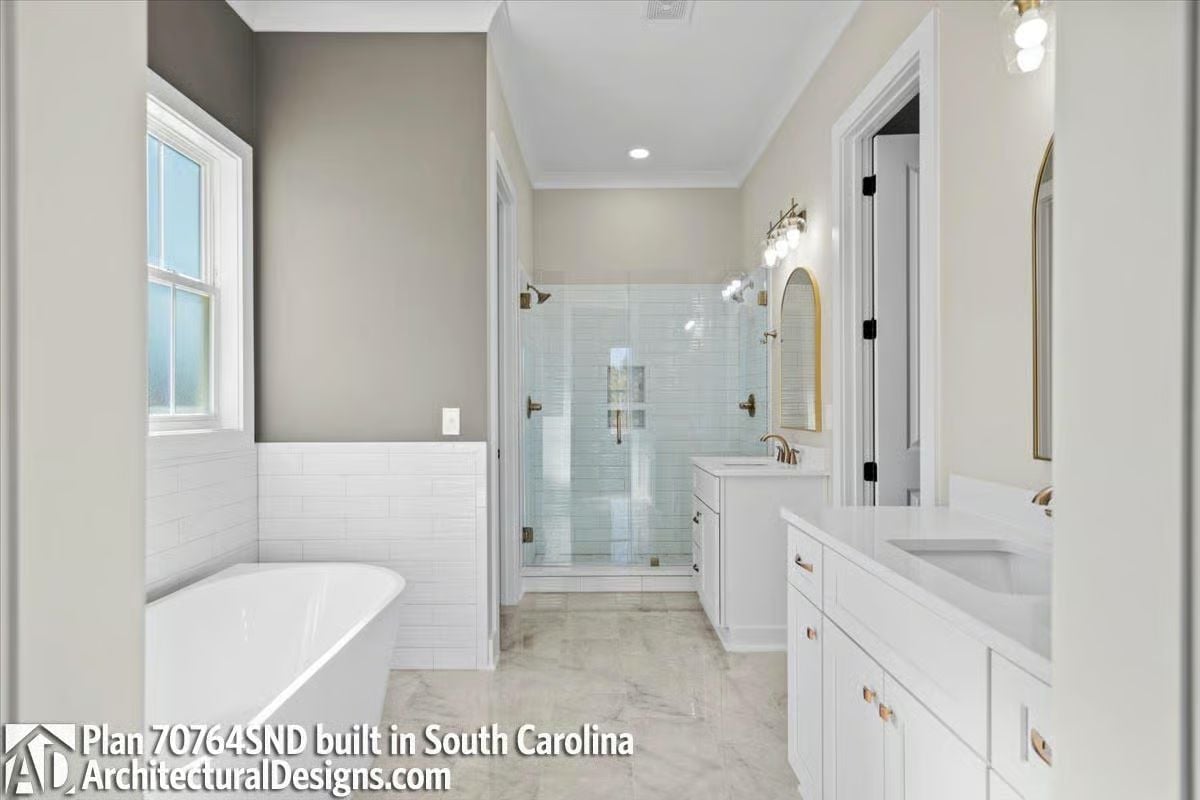 Soaking Tub Against Subway Tile Wainscoting Earns Every Square Foot