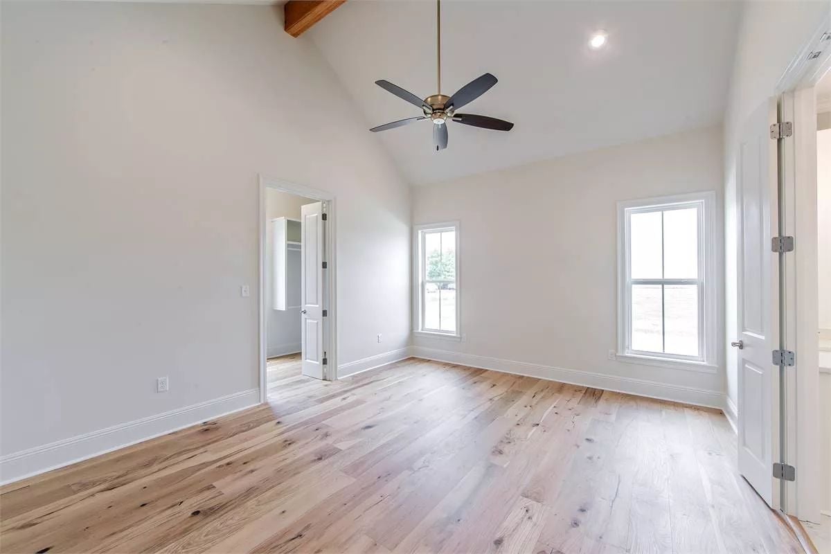 Vaulted Ceilings and Wide-Plank Wood Set the Tone Before Furniture Ever Arrives