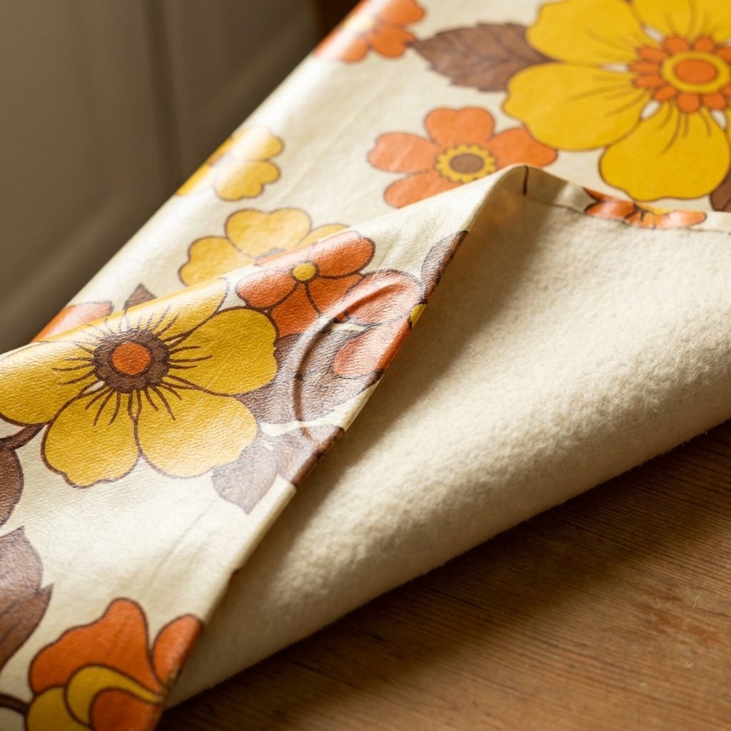 The Wipe-Clean Vinyl Tablecloth With the Flannel Backing