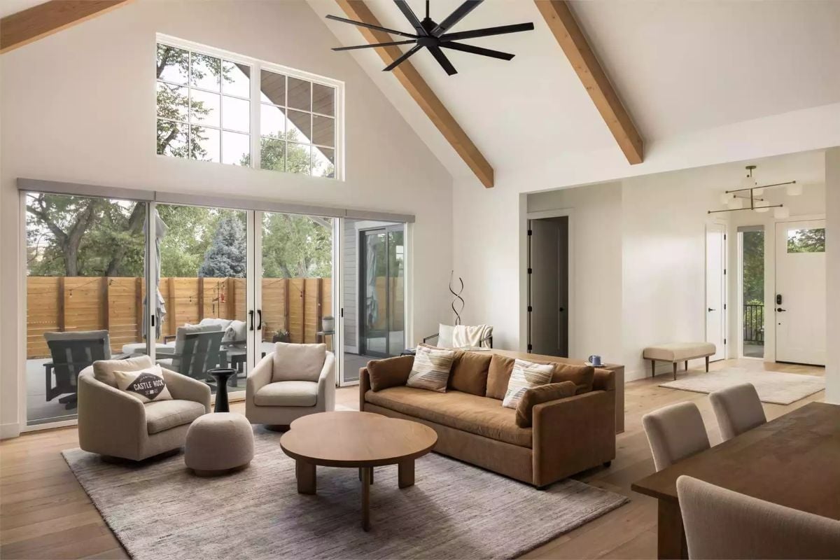 Vaulted Great Room Where the Sliding Glass Wall Does Most of the Work