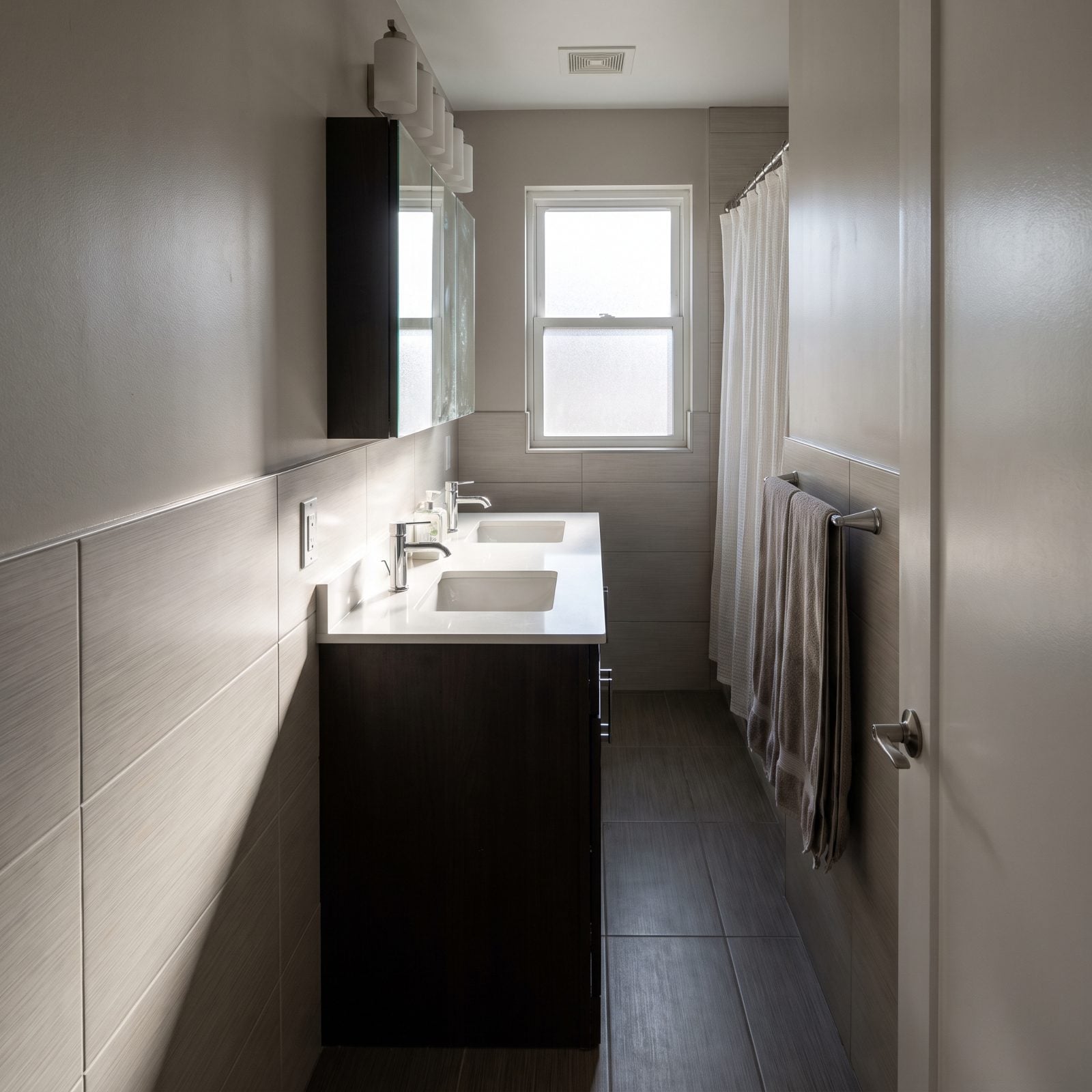 A 60-Inch Vanity Forced Into a Bathroom That Needs Breathing Room