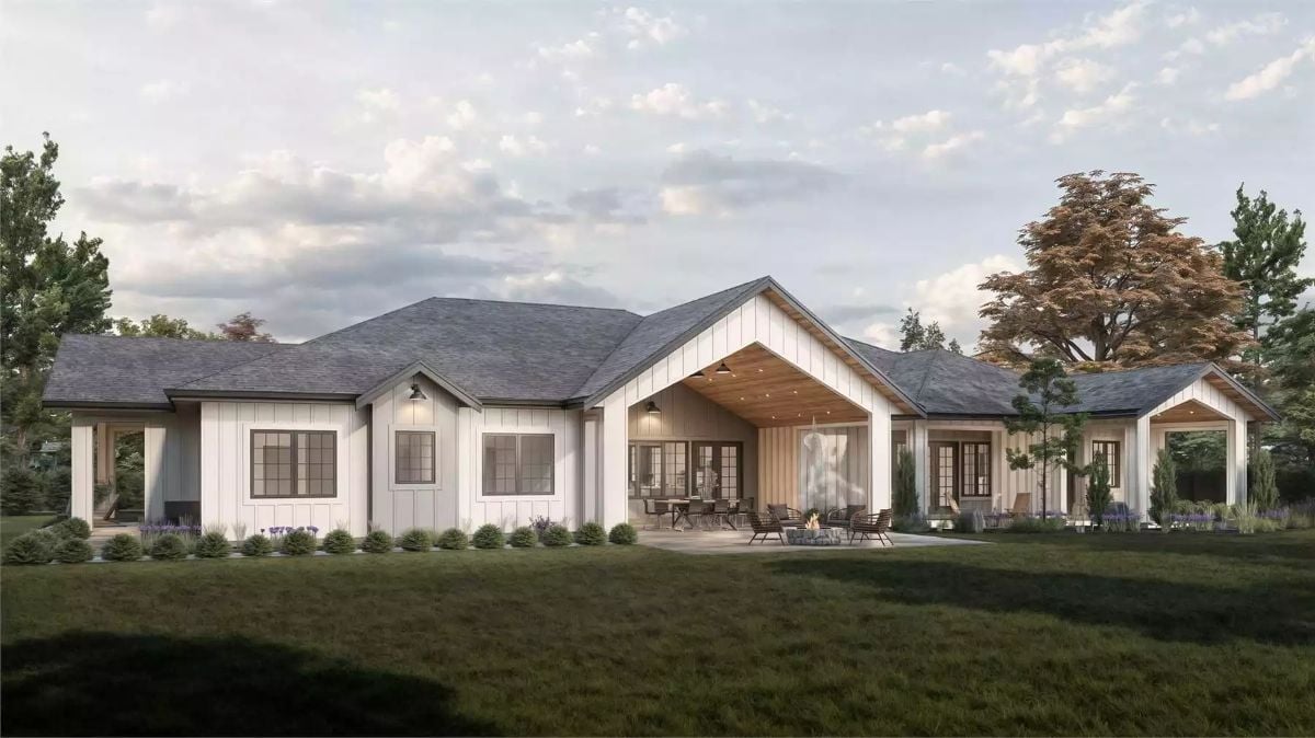 Board-and-Batten White Exterior with a Covered Outdoor Living Room Built Right In