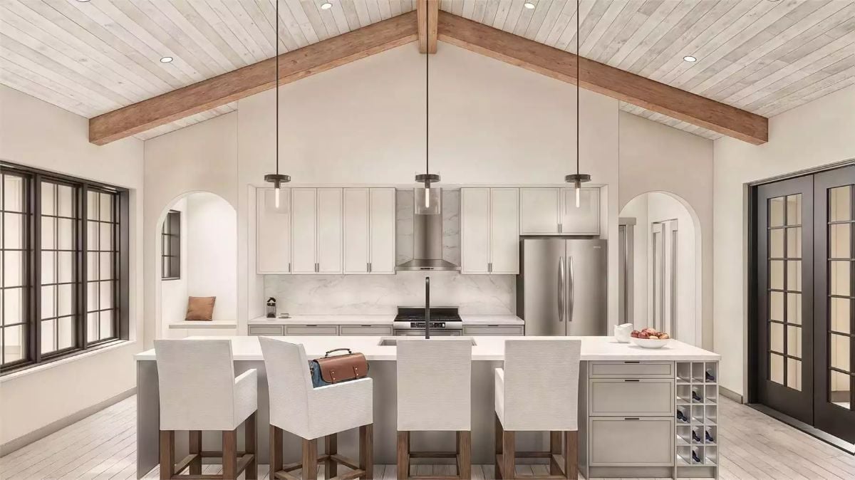 Vaulted Cathedral Ceilings and a Wine Rack Built Into the Island Say Everything