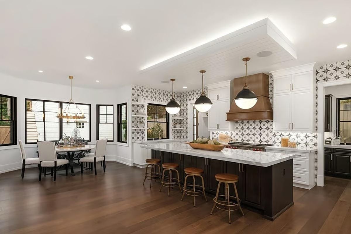 Copper Hood and Marble Island in a Kitchen Built for Real Cooking