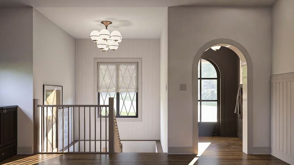 Arched Doorways and Diamond-Pane Windows on the Upper Landing