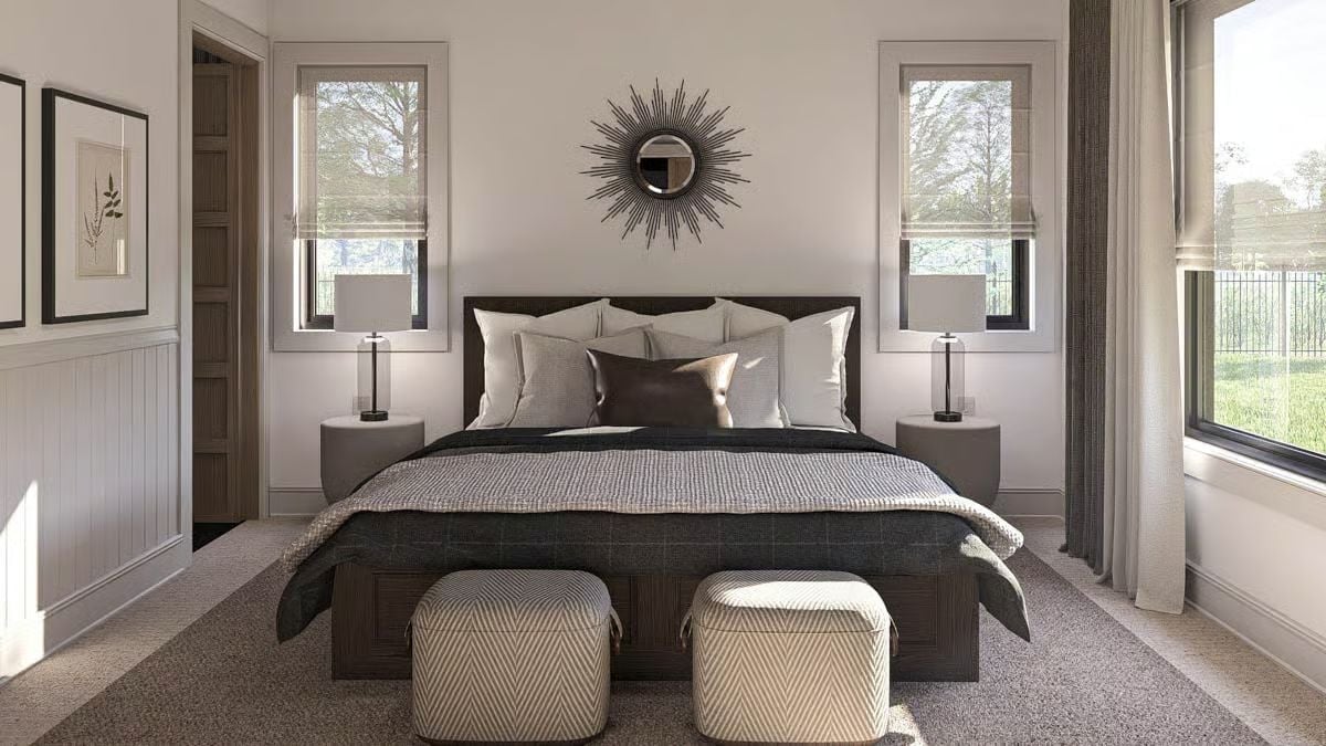 Sunburst Mirror, Layered Pillows, and Ottomans That Pull Double Duty