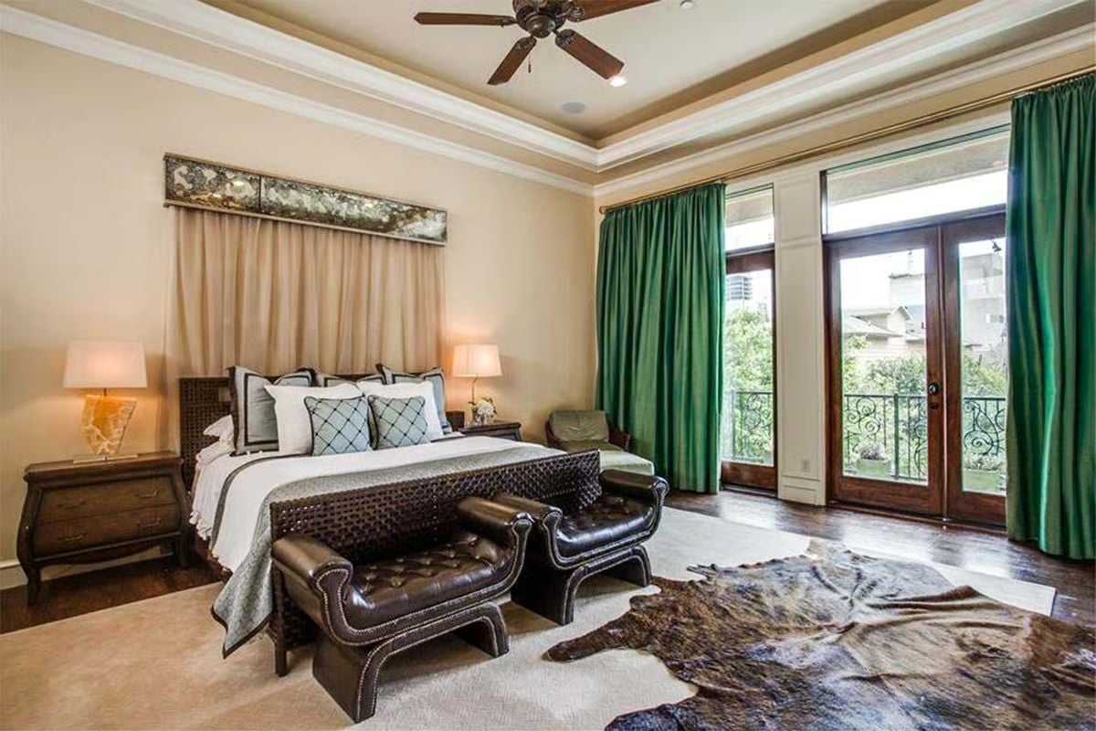 Green Silk Curtains, Cowhide Underfoot, and French Doors Worth Opening