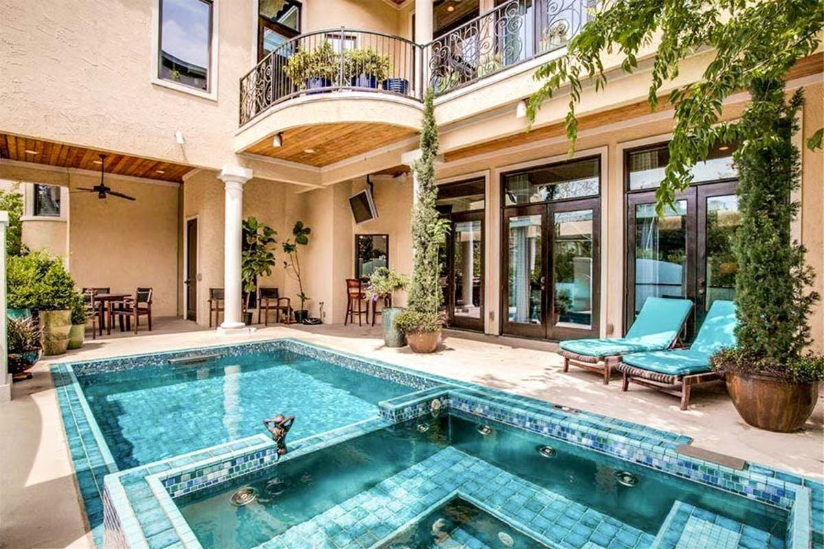 Mosaic Tile, a Spa Ledge, and a Courtyard Pool Built to Be Lived In