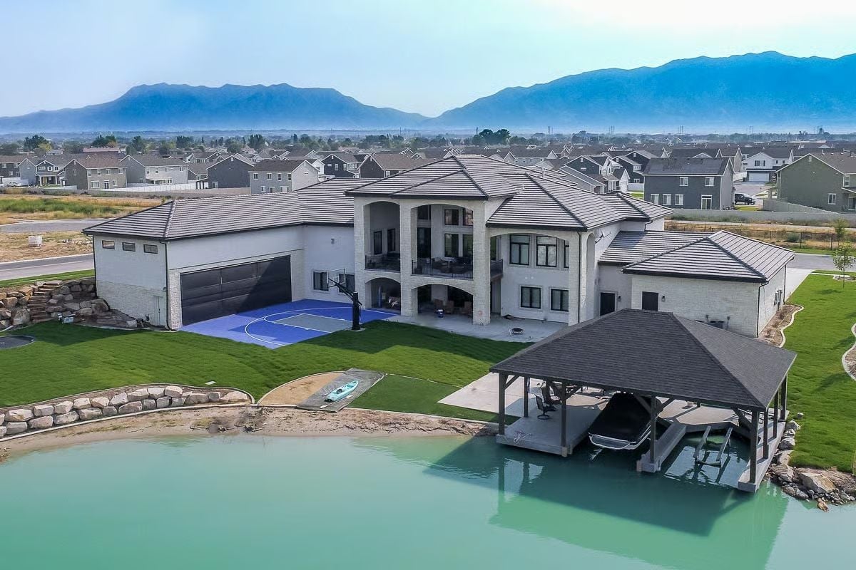 Lakefront Boat Dock, Sport Court, and Three-Car Garage on One Property