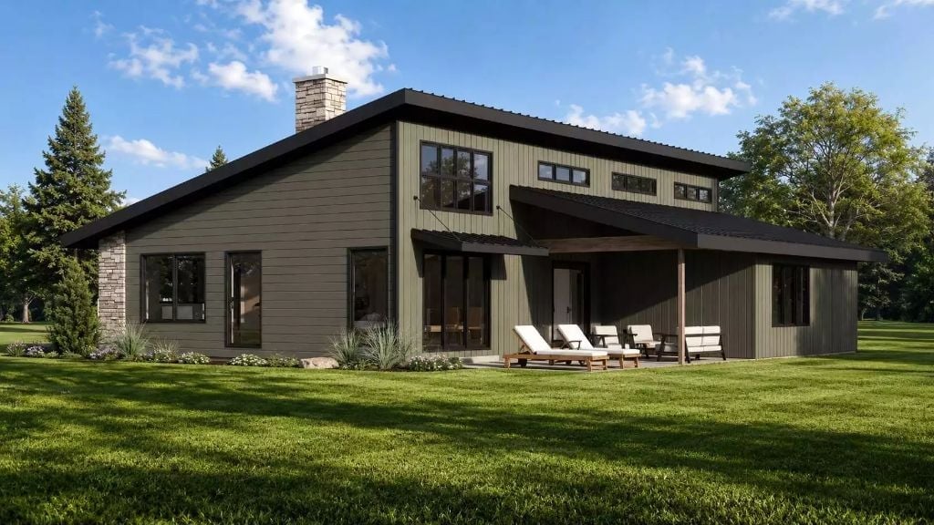 Dark Siding, Stone Corners, and a Covered Patio Built for Actual Outdoor Living