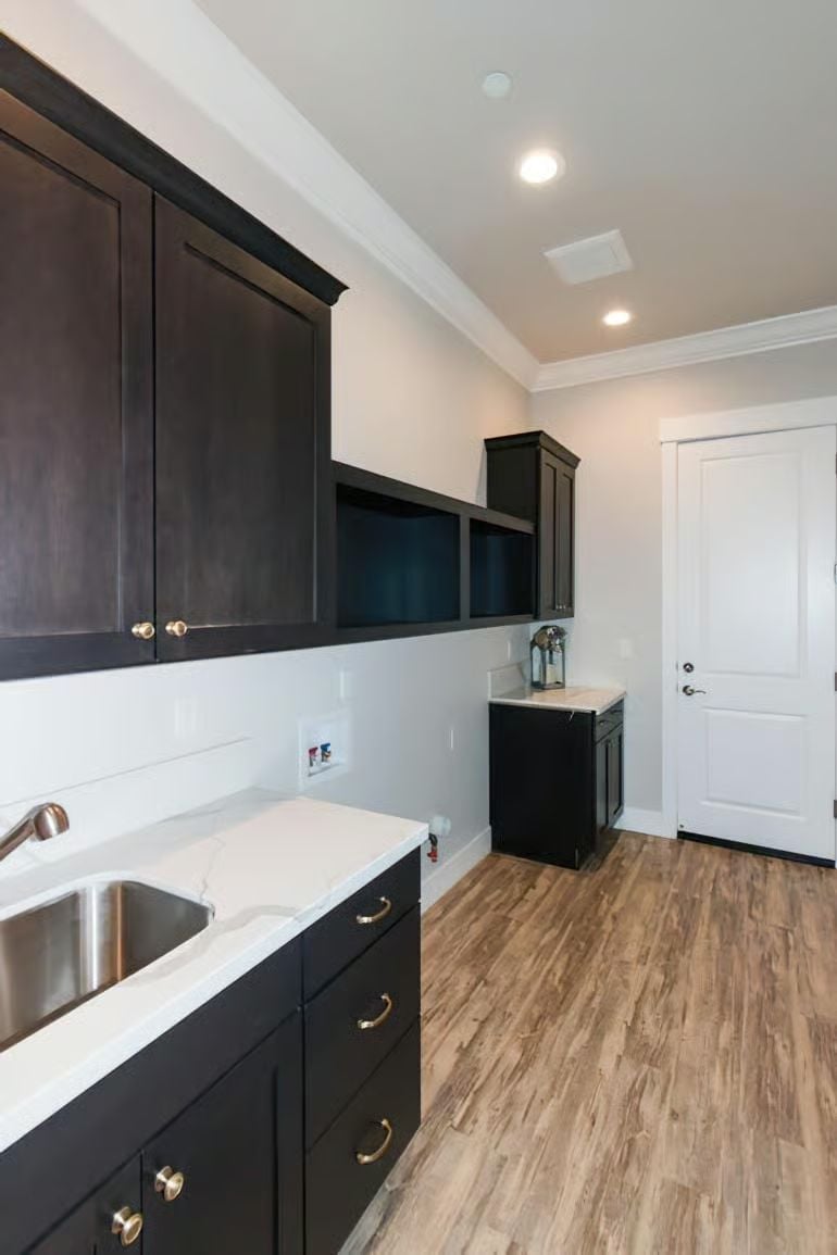 Matte Black Cabinetry and Gold Hardware in a Butler's Pantry That Actually Works