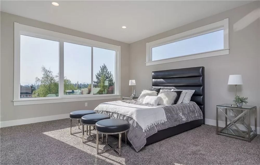 Black Leather Headboard, Silver Bedding, and a View That Earns Its Keep