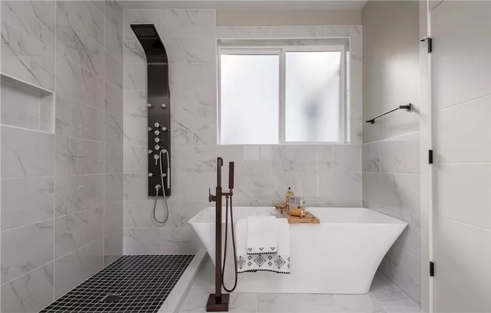 Matte Black Shower Column Pulls Every Fixture Into Line