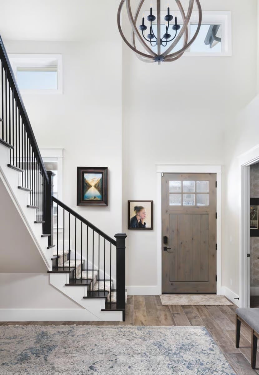 Orb Chandelier and a Craftsman Door Set the Tone Before You Take a Step Inside