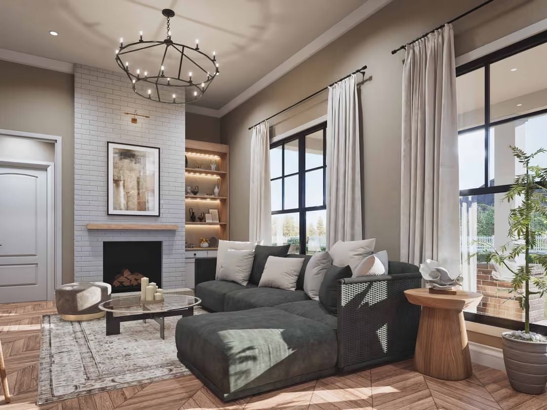 Wagon Wheel Chandelier, Gray Sectional, and a Fireplace Ready for Tonight
