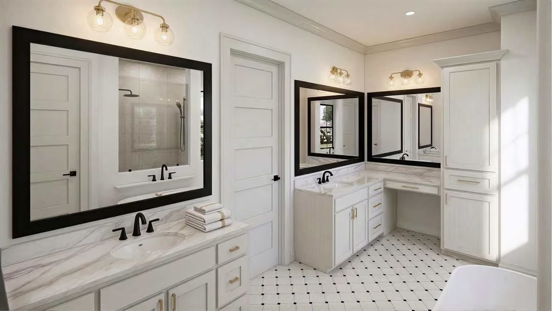 Dual Vanities, Black Frames, and Marble Counters Make This Primary Bath Worth the Square Footage